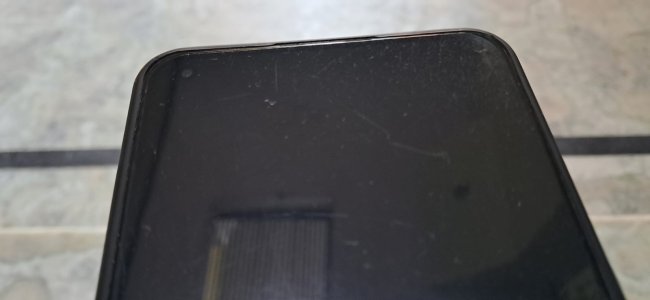 The quality is good... If the display was protected a little more with a cover, it would have provided protection to the screen if the phone falls on its side.